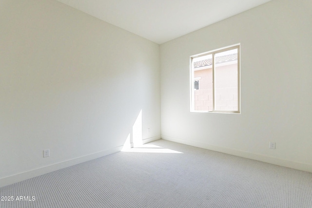 18950 W Ocotillo Rd, Waddell, AZ 85355 - unfurnished room with baseboards and carpet