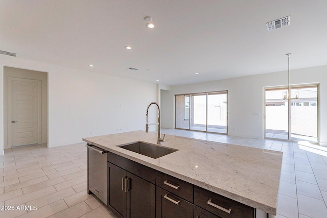 18950 W Ocotillo Rd, Waddell, AZ 85355 - kitchen with stainless steel dishwasher, a sink, visible vents, and a wealth of natural light