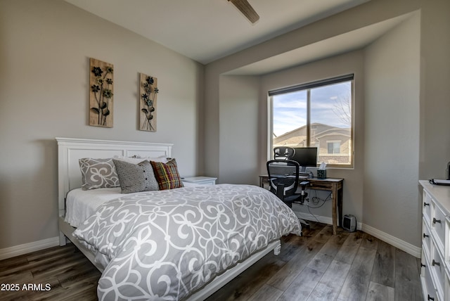 bedroom with dark wood-type flooring