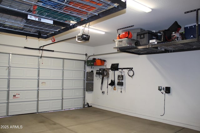 garage featuring a garage door opener