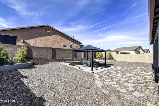 view of yard with a gazebo and a patio