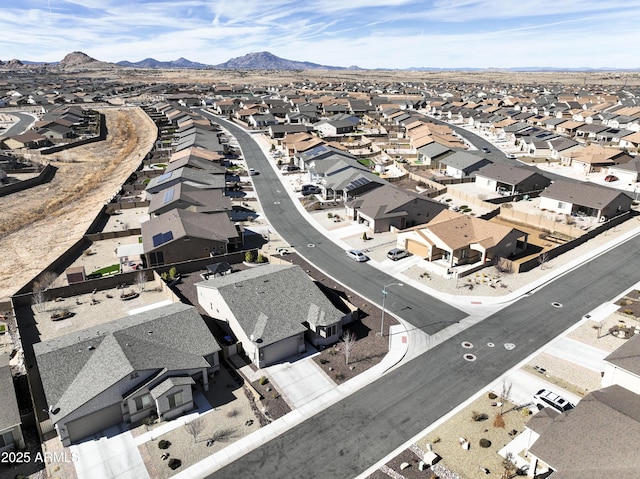 birds eye view of property featuring a mountain view