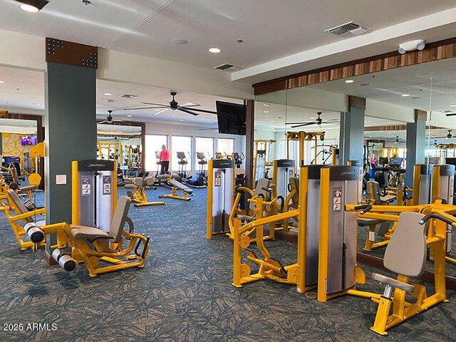 workout area featuring dark colored carpet