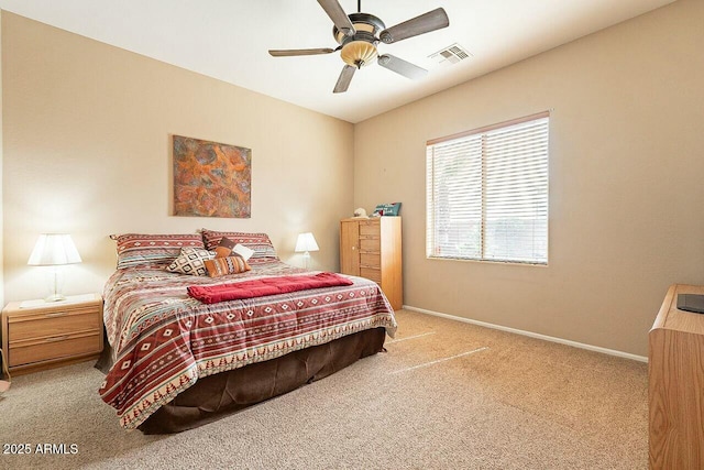 bedroom with carpet, visible vents, ceiling fan, and baseboards