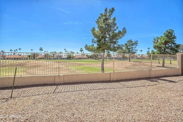 view of property's community with fence