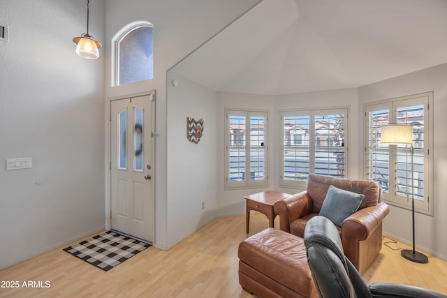 entrance foyer featuring light wood-type flooring, visible vents, and baseboards