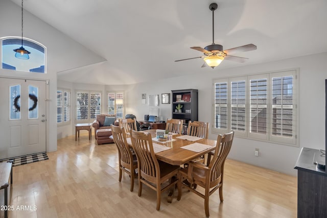 dining room with light wood-type flooring and ceiling fan