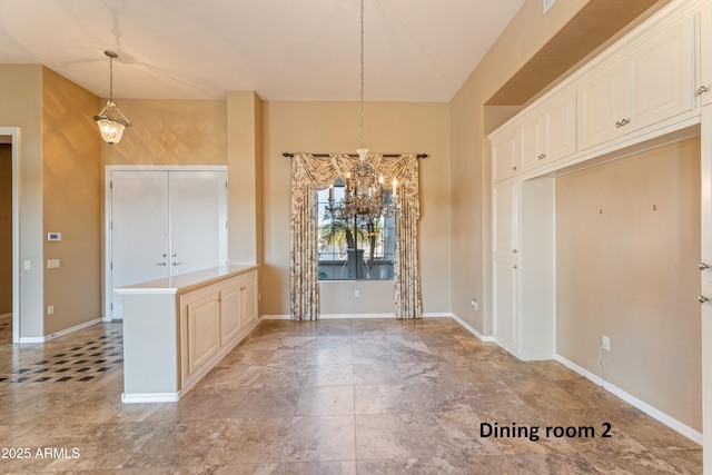 interior space featuring decorative light fixtures and a chandelier