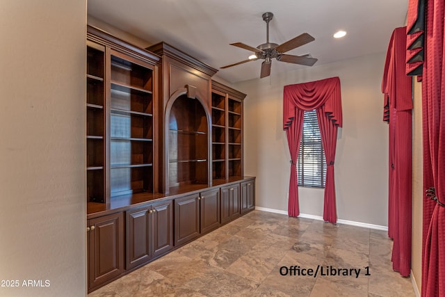 interior space featuring ceiling fan