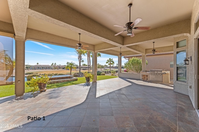 view of patio with exterior kitchen