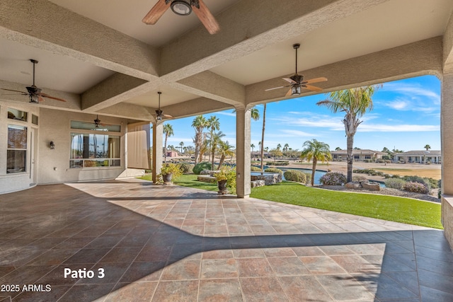 view of patio with ceiling fan