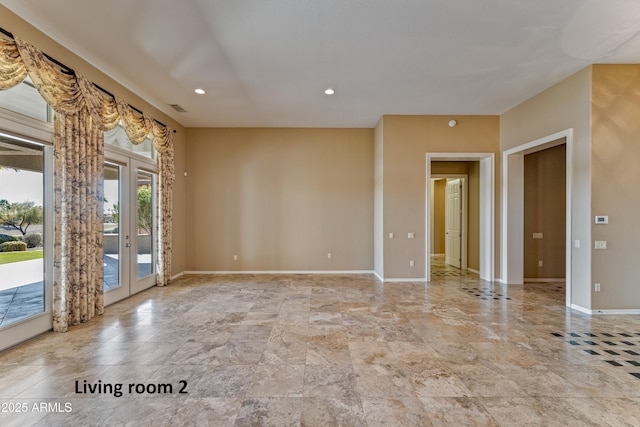 empty room featuring french doors