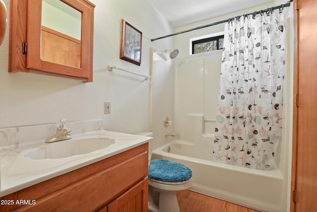 9434 W Obier Dr, Pine, AZ 85544 - full bath with shower / bath combo, toilet, vanity, and wood finished floors