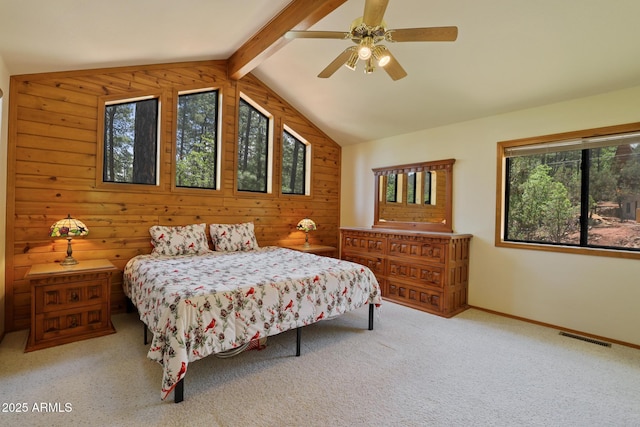 9434 W Obier Dr, Pine, AZ 85544 - bedroom featuring wooden walls, carpet floors, a ceiling fan, and baseboards