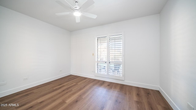 unfurnished room featuring ceiling fan and wood-type flooring