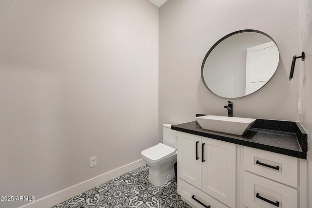 26112 N 7th Ave, Phoenix, AZ 85085 - half bath featuring baseboards, vanity, and toilet