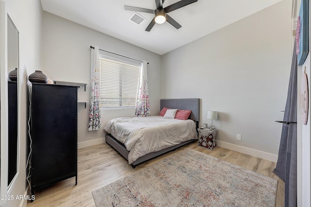 26112 N 7th Ave, Phoenix, AZ 85085 - bedroom featuring wood finished floors, baseboards, and ceiling fan