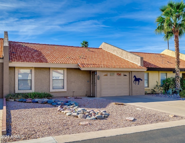 ranch-style house with a garage