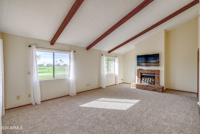 unfurnished living room featuring a fireplace, light carpet, and plenty of natural light