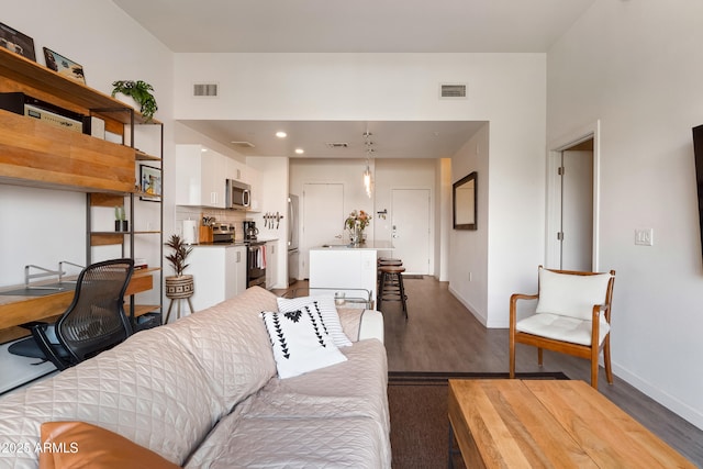 living room with dark wood-type flooring