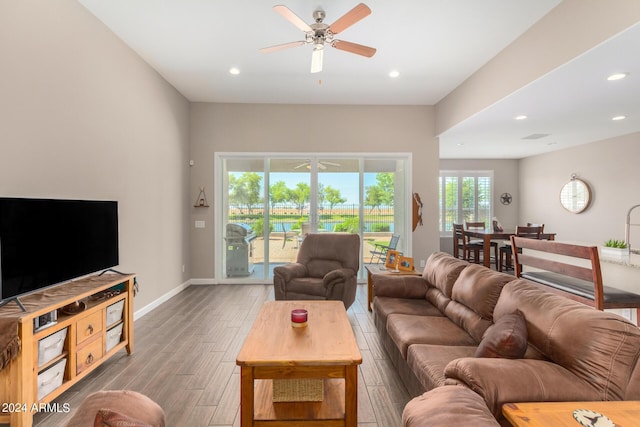 living room featuring ceiling fan