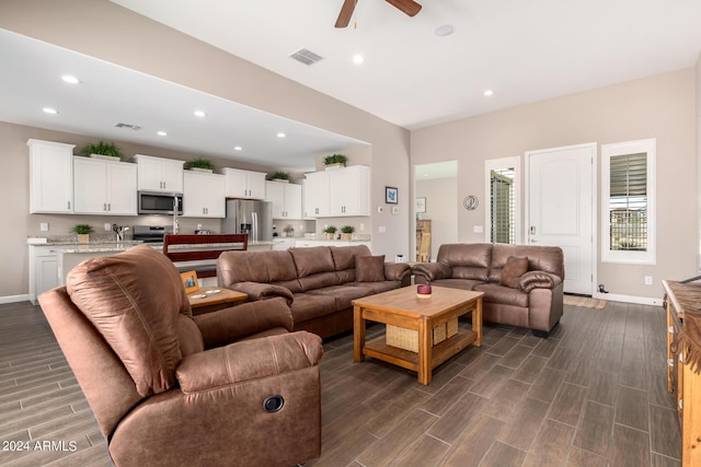 living room with ceiling fan