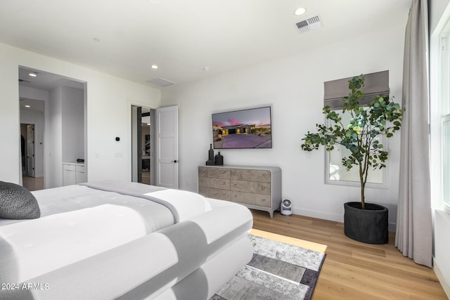 bedroom featuring light wood-type flooring