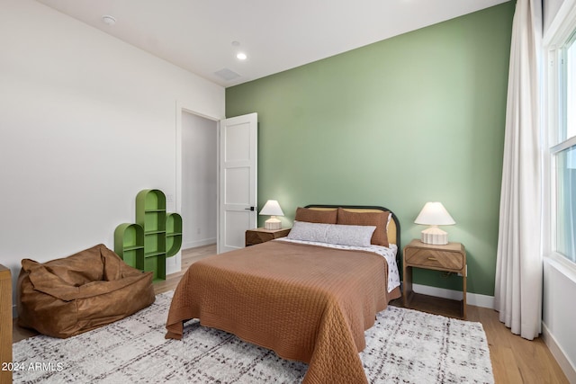 bedroom featuring light hardwood / wood-style floors