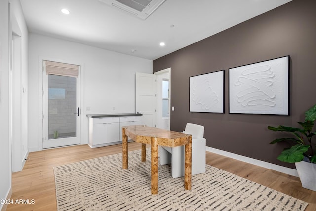 dining area with light hardwood / wood-style floors