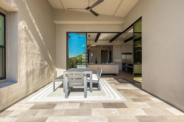 view of patio / terrace featuring ceiling fan