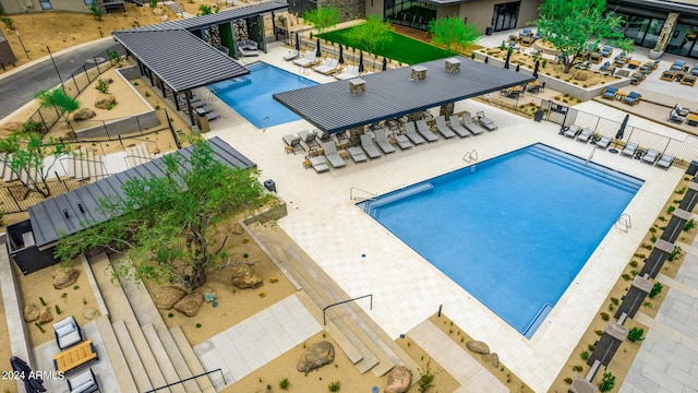 view of swimming pool with a patio