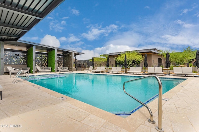 view of pool featuring a patio area