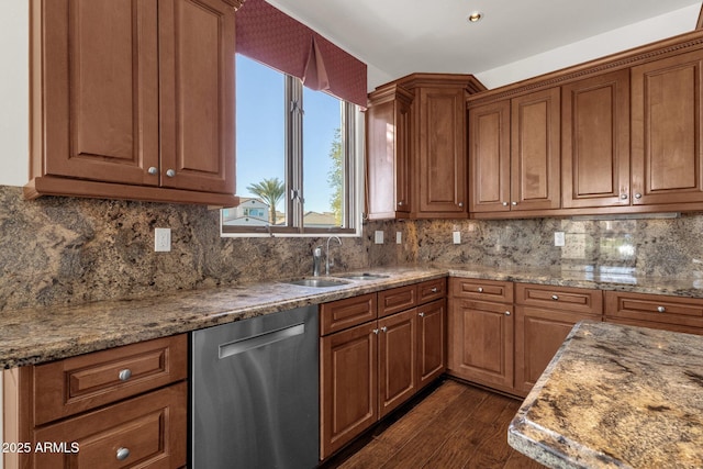 kitchen with sink, dishwasher, light stone counters, decorative backsplash, and dark hardwood / wood-style flooring