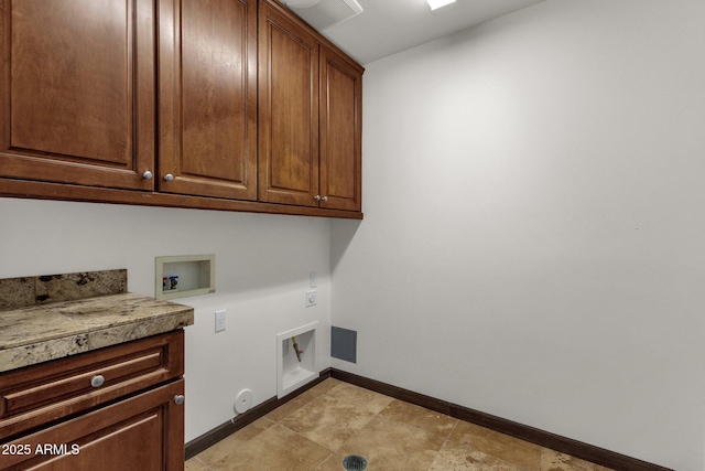 washroom featuring gas dryer hookup, cabinets, hookup for a washing machine, and electric dryer hookup