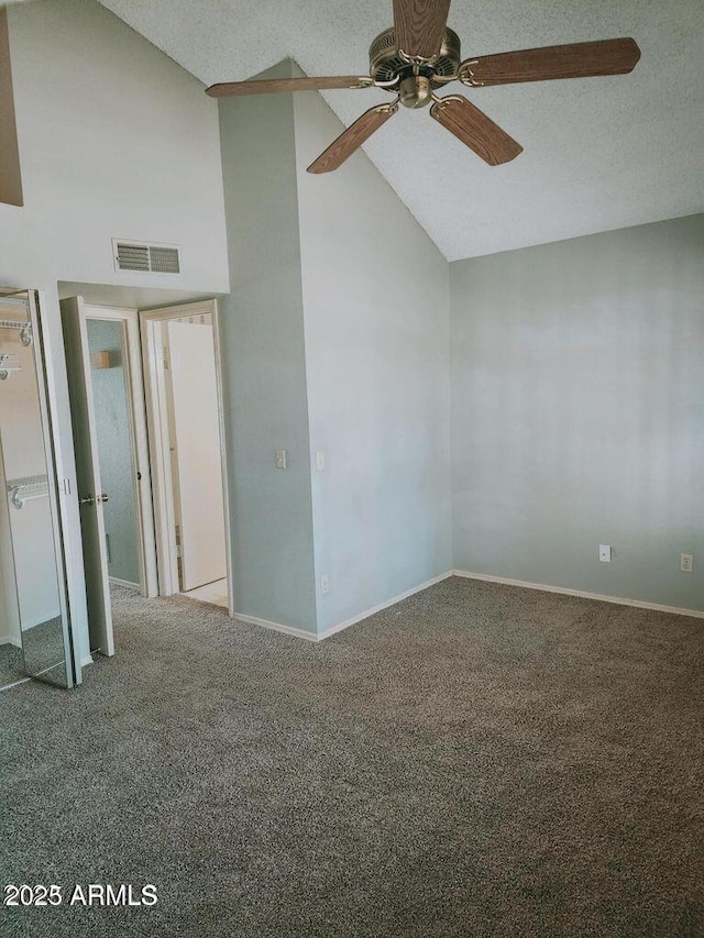 5704 E Aire Libre Ave Unit 1038, Scottsdale, AZ 85254 - unfurnished bedroom with carpet flooring, high vaulted ceiling, and a ceiling fan
