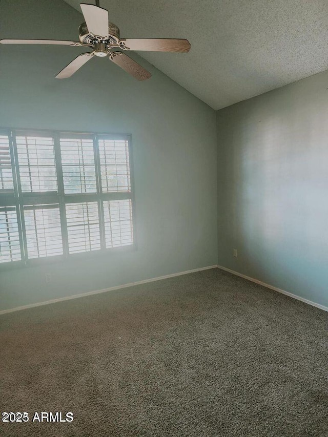 5704 E Aire Libre Ave Unit 1038, Scottsdale, AZ 85254 - unfurnished room with ceiling fan, carpet, lofted ceiling, and a textured ceiling