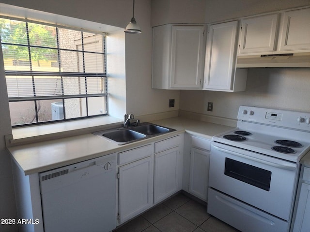 5704 E Aire Libre Ave Unit 1038, Scottsdale, AZ 85254 - kitchen featuring white appliances, under cabinet range hood, white cabinets, and light countertops