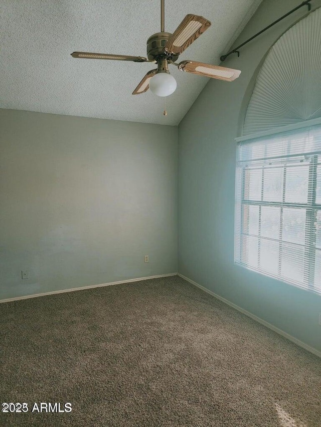 5704 E Aire Libre Ave Unit 1038, Scottsdale, AZ 85254 - carpeted spare room featuring a ceiling fan, vaulted ceiling, and a textured ceiling