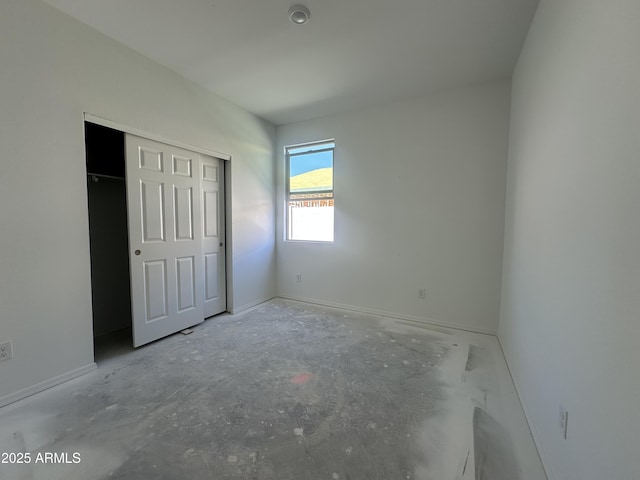 47230 W Cansados Rd, Maricopa, AZ 85139 - unfurnished bedroom with a closet and baseboards