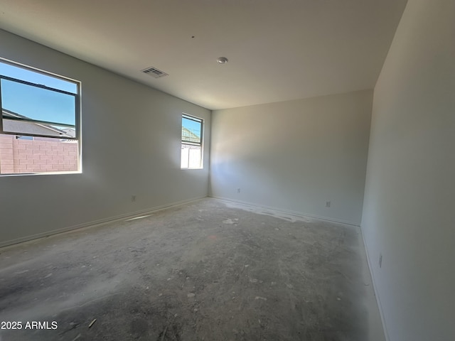 47230 W Cansados Rd, Maricopa, AZ 85139 - empty room with concrete floors and baseboards