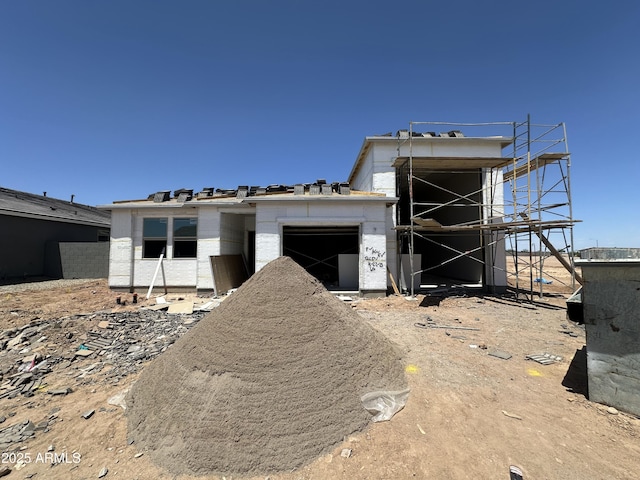 property in mid-construction featuring an attached garage