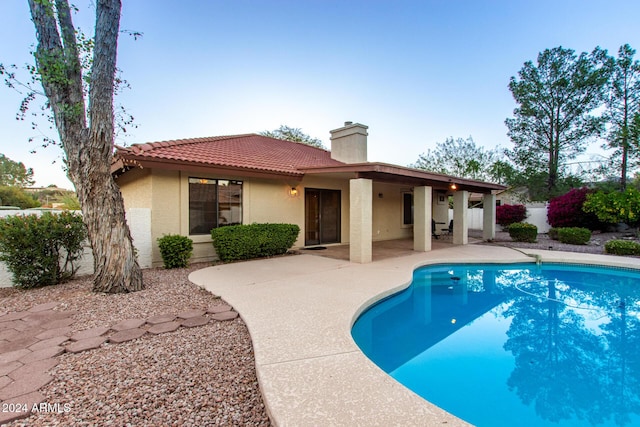 rear view of house featuring a patio area