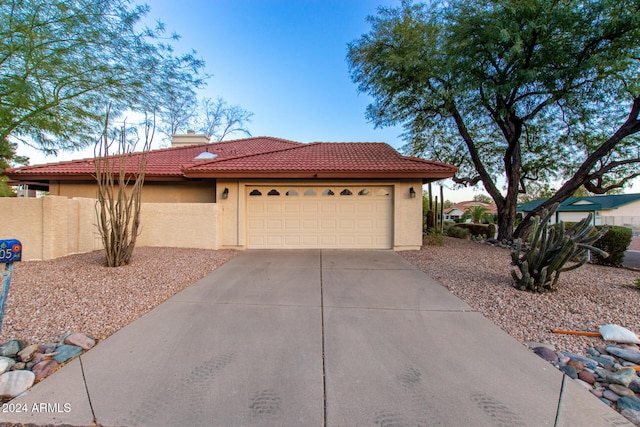 view of front of house with a garage