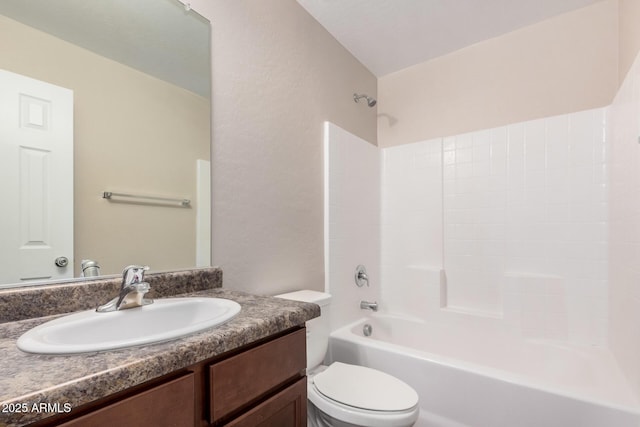 full bathroom with shower / bathing tub combination, toilet, and vanity