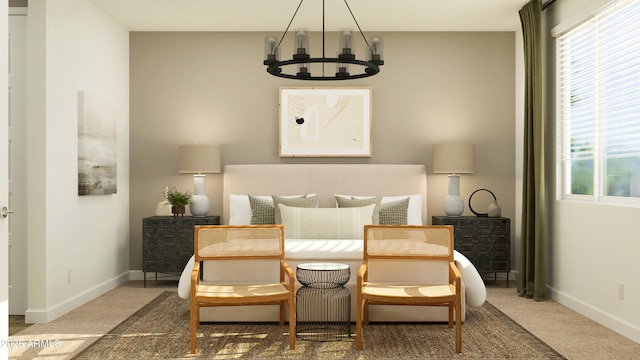 carpeted bedroom with baseboards and an inviting chandelier