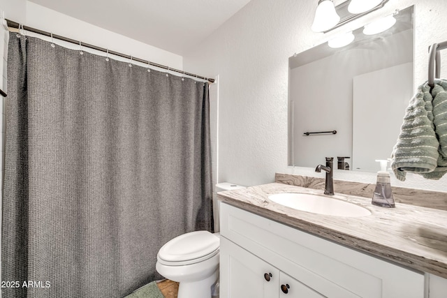 14801 N 25th Dr Unit 2, Phoenix, AZ 85023 - full bathroom with toilet, vanity, a textured wall, and a shower with curtain