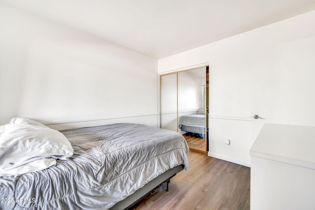 14801 N 25th Dr Unit 2, Phoenix, AZ 85023 - bedroom with wood finished floors and a closet