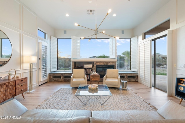 sunroom with a chandelier