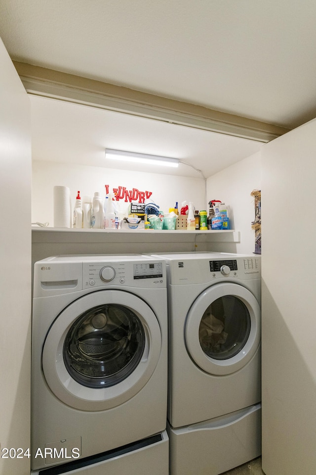 laundry room with separate washer and dryer