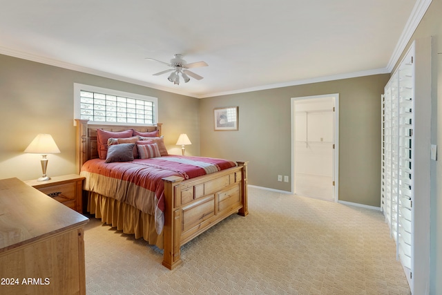 bedroom featuring ceiling fan, crown molding, and light carpet